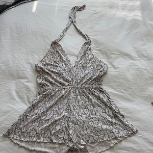 Navy blue and cream printed halter style romper